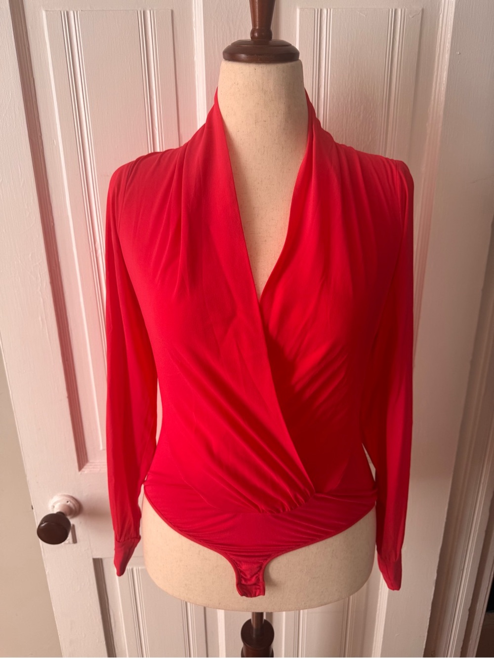 Bebe Women's Surplice Long-Sleeve Bodysuit, size M